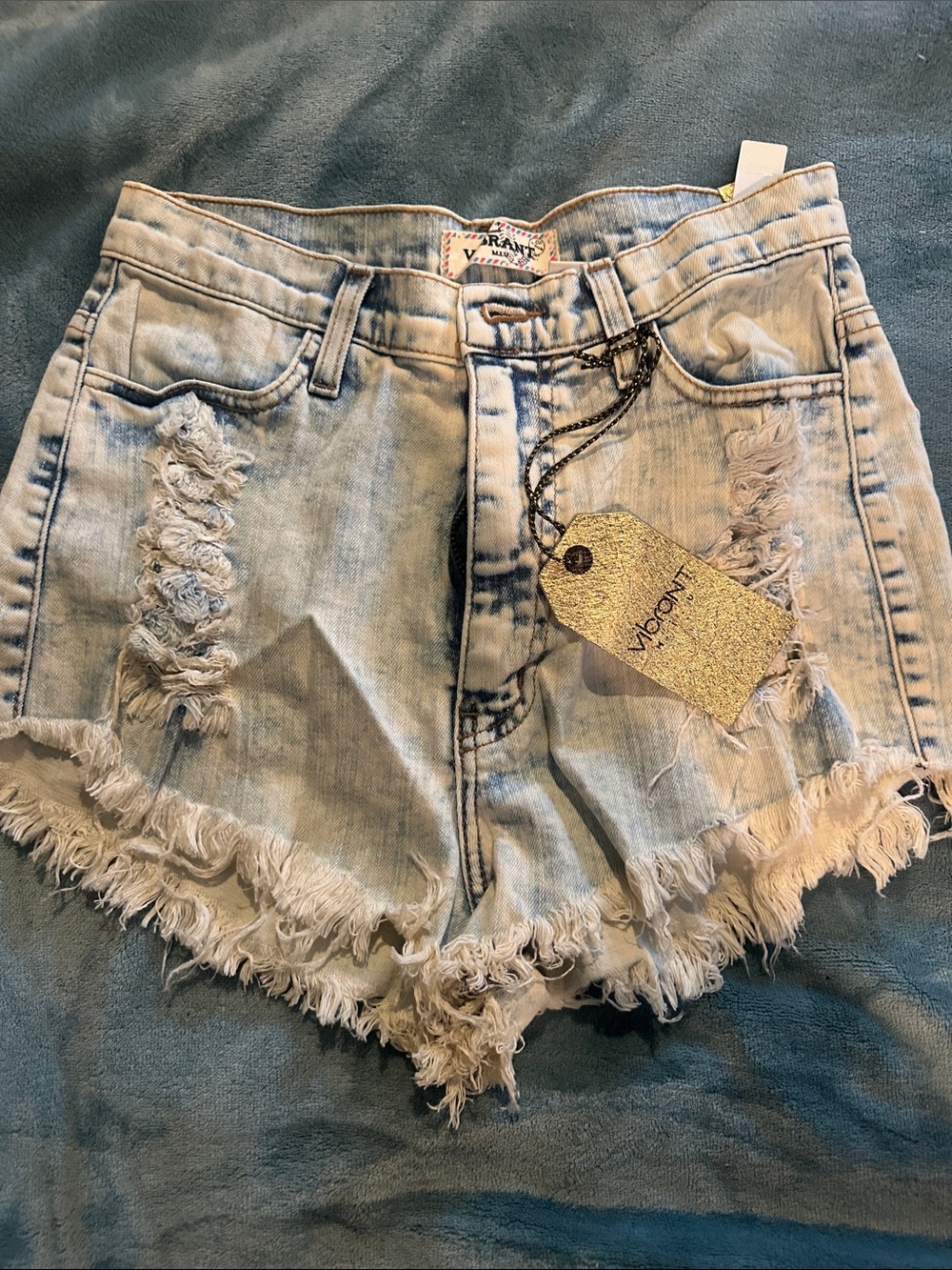 Vibrant Light Blue Distressed Denim Cutoff Shorts